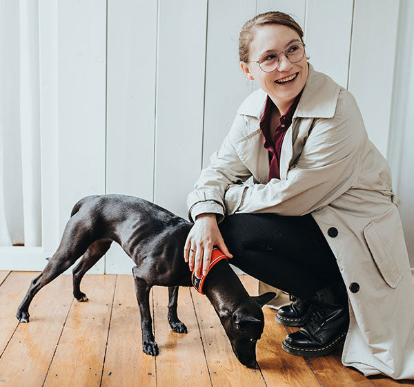 woman petting dog