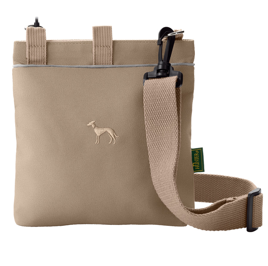 ALVA Treat Bag - Hunter Pet Store -fillable snack bag to hang around or attach to your belt -ideal for storing all kinds of snacks -made of robust, waterproof outer material (100% recycled) -washable inner material (100% recycled) -easy to open and close with magnetic closure -with additional storage options for keys, mobile phone etc. -with all-round reflective piping for additional visibility