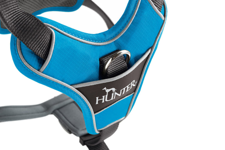 DIVO Harness - Hunter Pet Store -five-point adjustment -ergonomic fit -comfortable padding with soft, breathable mesh material and neoprene -highly reflective thanks to the 3M™ Scotchlite™ Reflective Material and HUNTER logo print -features two D-rings for attaching a leash to the dog’s back and chest -the D-ring on the chest can be tucked away easily